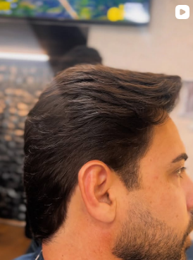 Corte clássico com topete alinhado