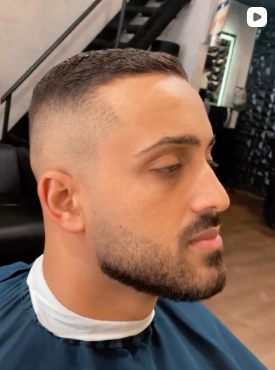 Corte militar com barba alinhada